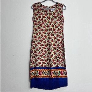 Rare Vintage Couture Dress by Adele Simpson 
Fully lined  royal blue fringe hem